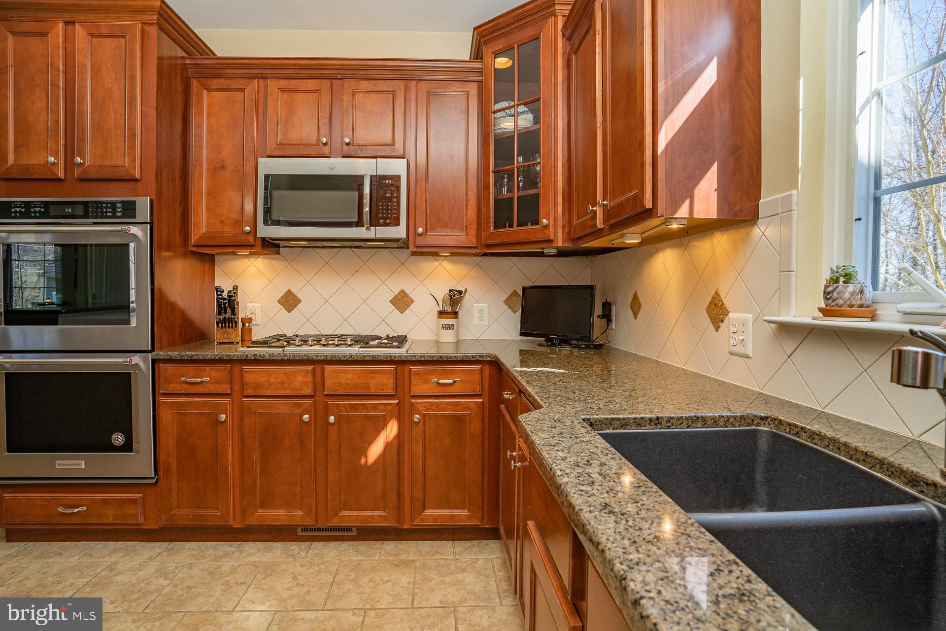 99 Cedarcroft Road Kennett Square, PA 19348 - Photo 3 of 39 Cherry cabinets & workspace