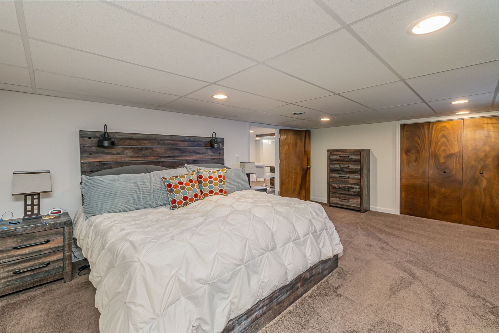 4120 Woodrow Wilson Road Springfield, TN 37172 - Photo 11 of 38 a large bedroom with a bed and a flat screen tv