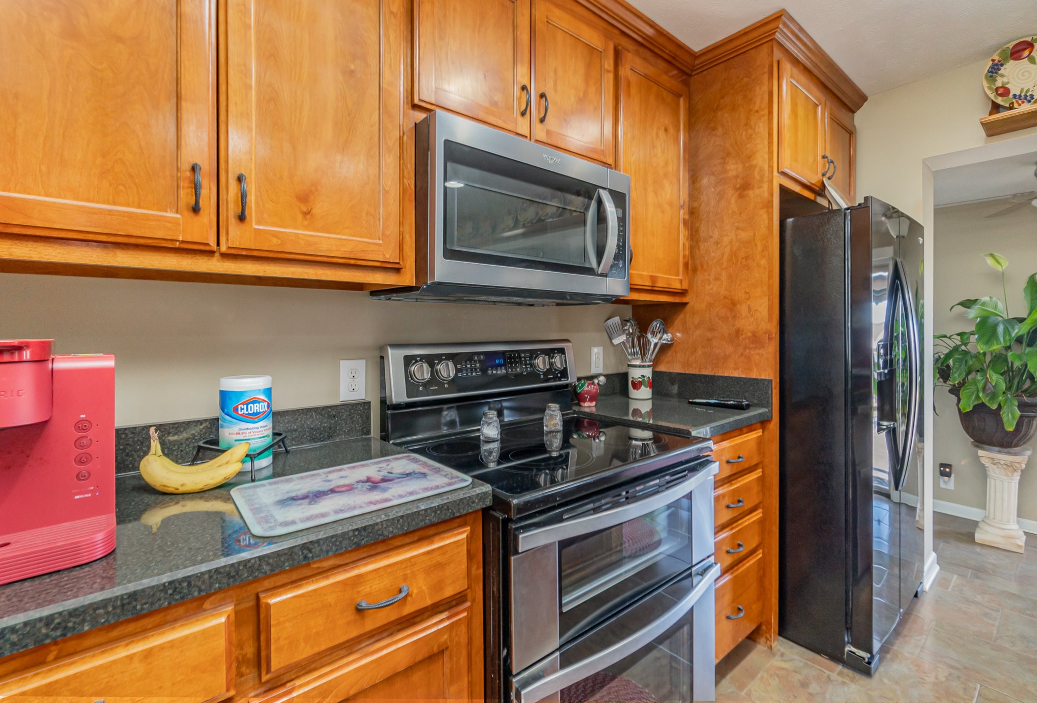 4120 Woodrow Wilson Road Springfield, TN 37172 - Photo 8 of 38 a kitchen with granite countertop stainless steel appliances and cabinets
