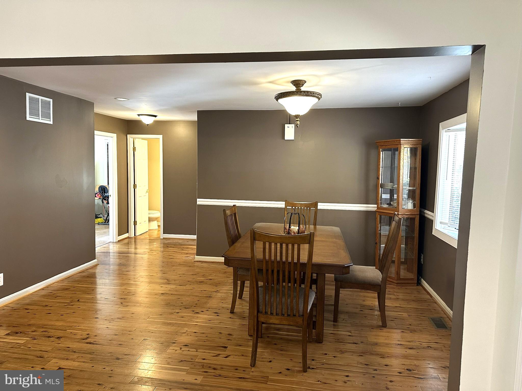747 Elmhurst Road Severn, MD 21144 - Photo 9 of 23 Dining room - nice hardwood floors