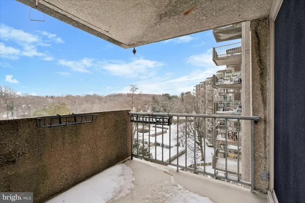 a view of a balcony with an outdoor space