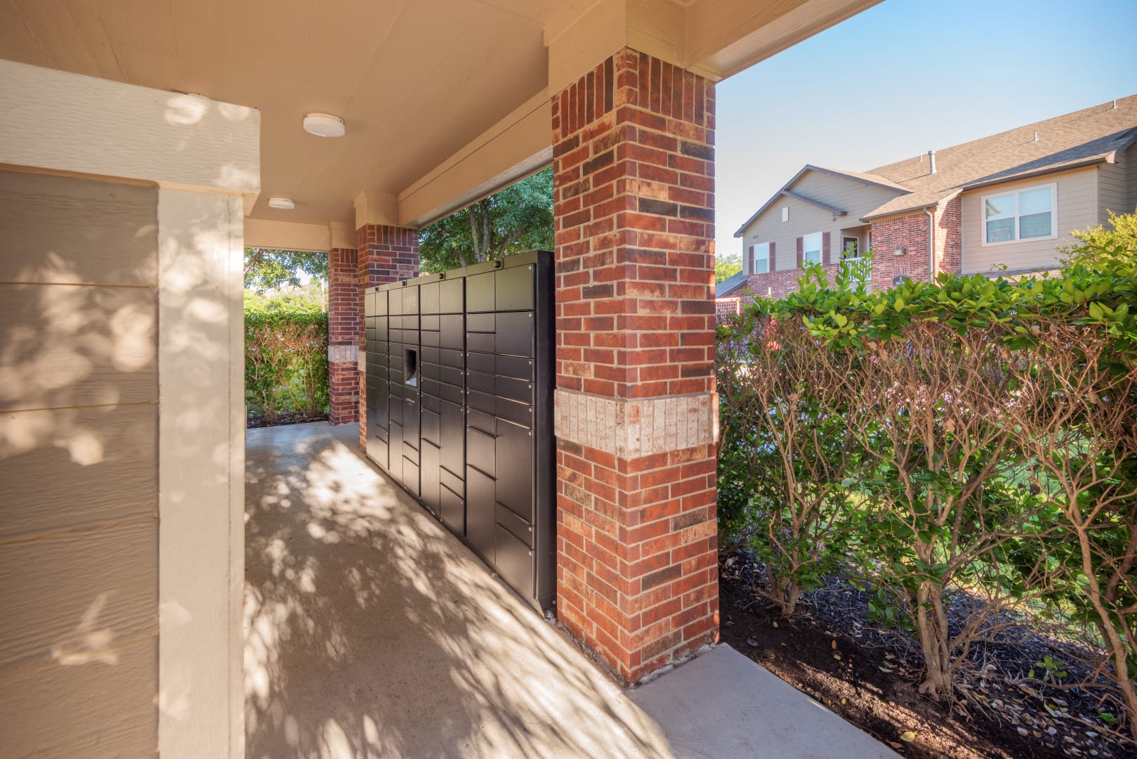 12101 Dessau Road, Unit 1405 Austin, TX 78754 - Photo 15 of 20 a view of a brick house with a backyard
