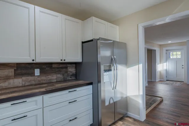 a view of kitchen with livingroom