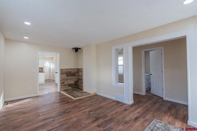 a view of kitchen and wooden floor