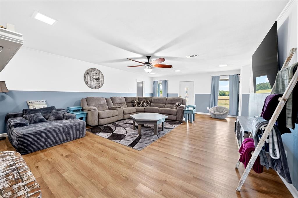 660 VZ County Road Canton, TX 75103 - Photo 6 of 39 Spacious living area featuring wood-finish flooring, a ceiling fan, and recessed lighting