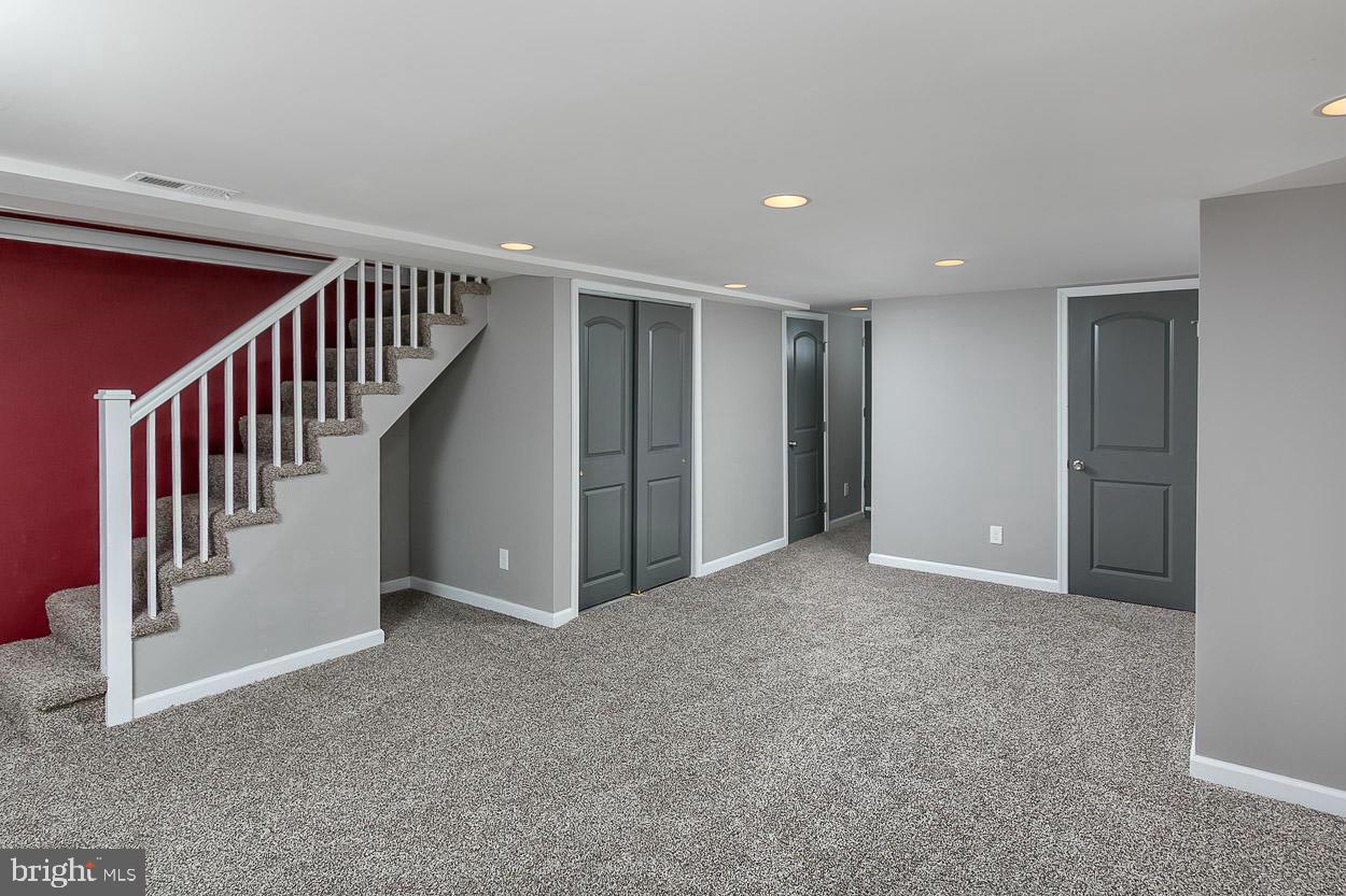 3815 Yolando Road Baltimore, MD 21218 - Photo 16 of 20 a view of an empty room with stairs