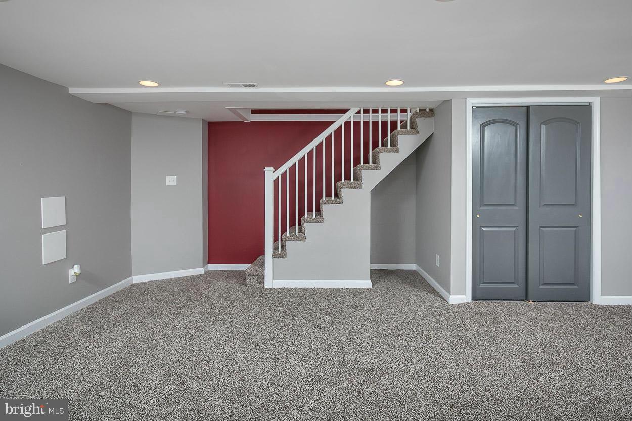 3815 Yolando Road Baltimore, MD 21218 - Photo 17 of 20 a view of an empty room with stairs