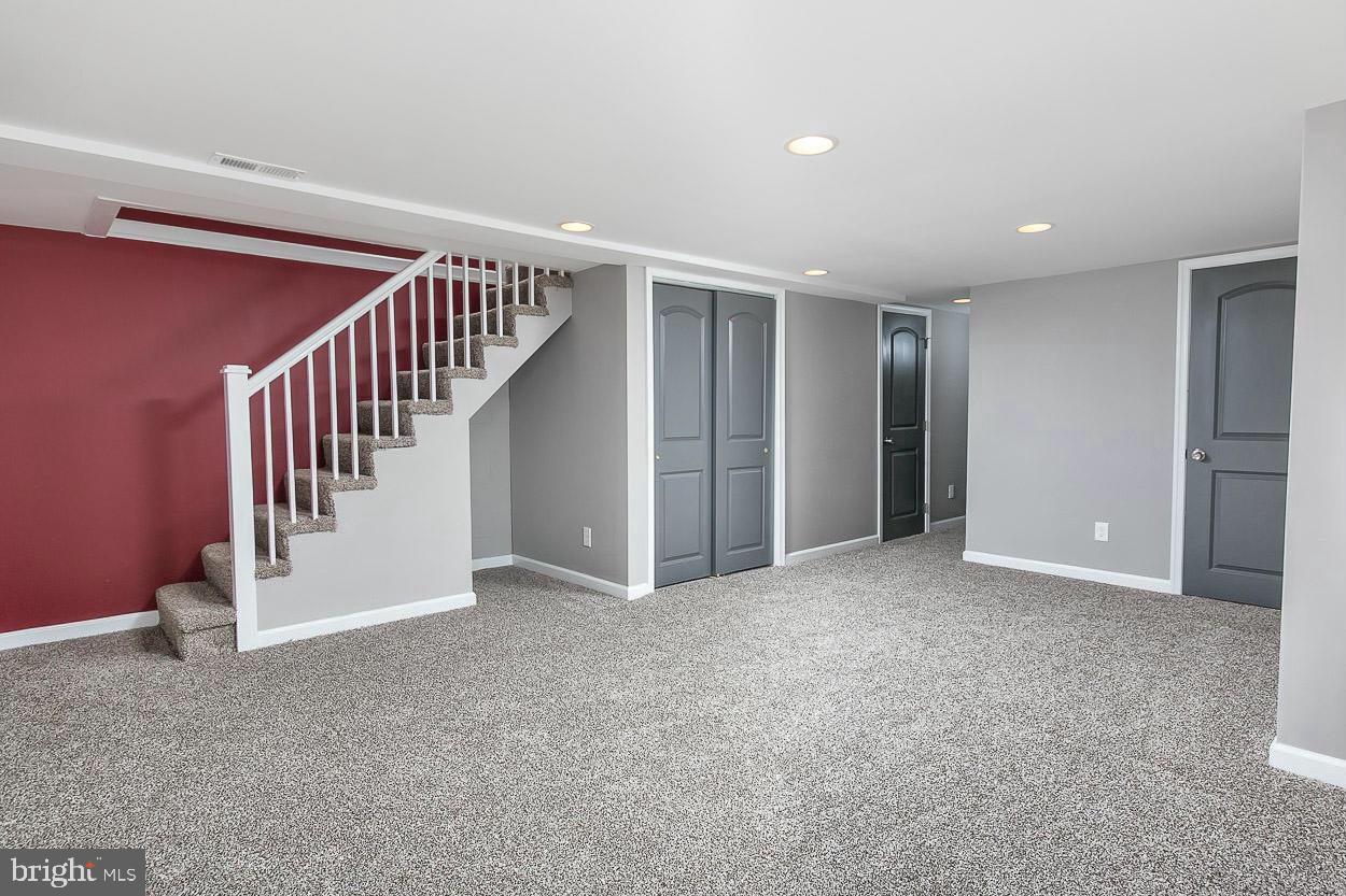 3815 Yolando Road Baltimore, MD 21218 - Photo 18 of 20 a view of an empty room with stairs