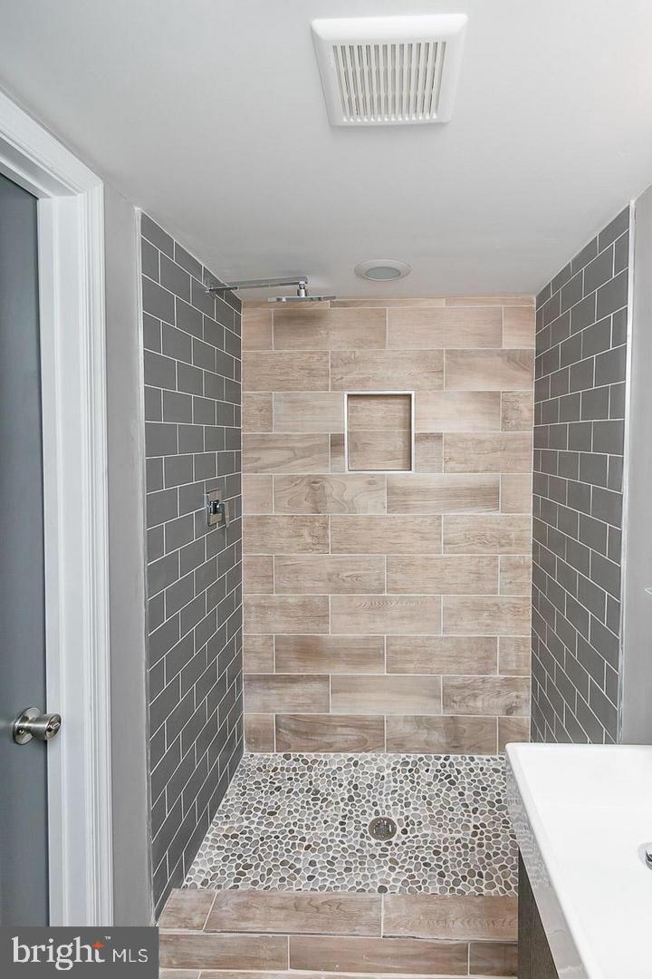 3815 Yolando Road Baltimore, MD 21218 - Photo 20 of 20 a bathroom with a shower