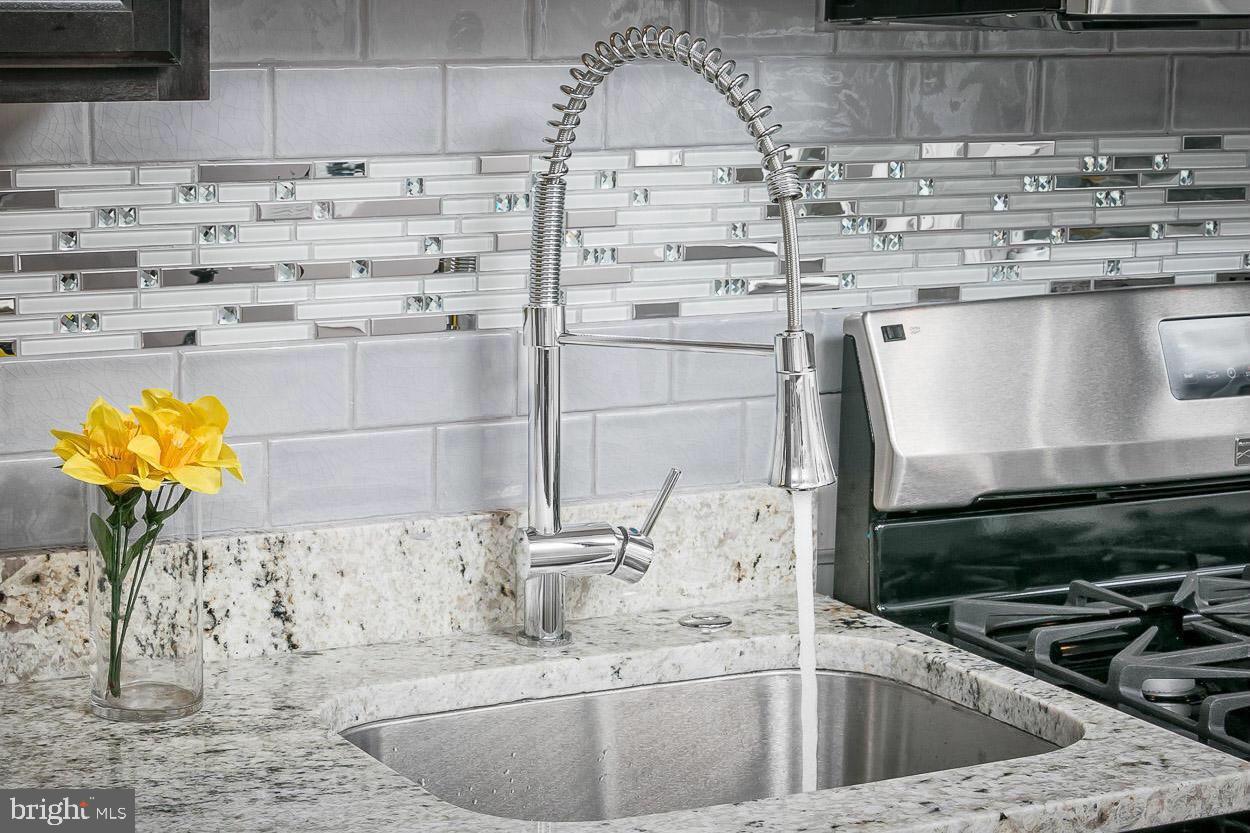 3815 Yolando Road Baltimore, MD 21218 - Photo 4 of 20 a kitchen with a sink and a stove