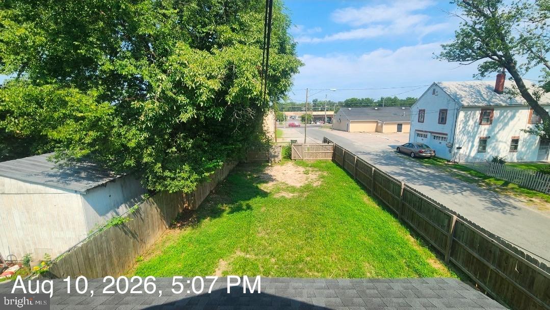 3900 Decatur Street Richmond, VA 23224 - Photo 19 of 19 Spacious backyard with lush greenery.