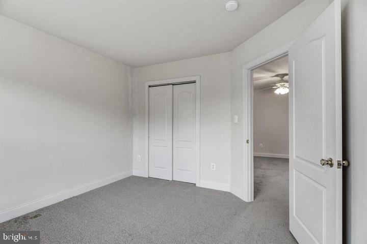 576 Orchard Ridge Drive, Unit 100 Gaithersburg, MD 20878 - Photo 23 of 44 a view of an empty room with closet and mirror