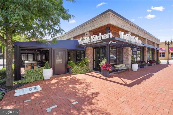 576 Orchard Ridge Drive, Unit 100 Gaithersburg, MD 20878 - Photo 40 of 44 a view of a cafe with a patio