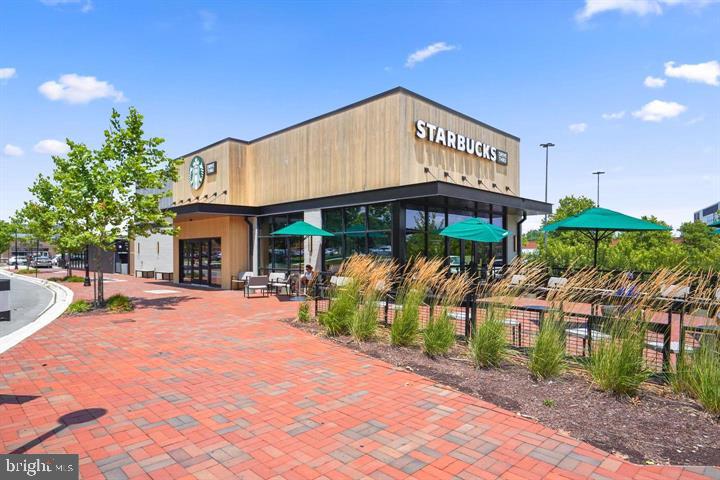 576 Orchard Ridge Drive, Unit 100 Gaithersburg, MD 20878 - Photo 42 of 44 a view of a cafe with sitting area