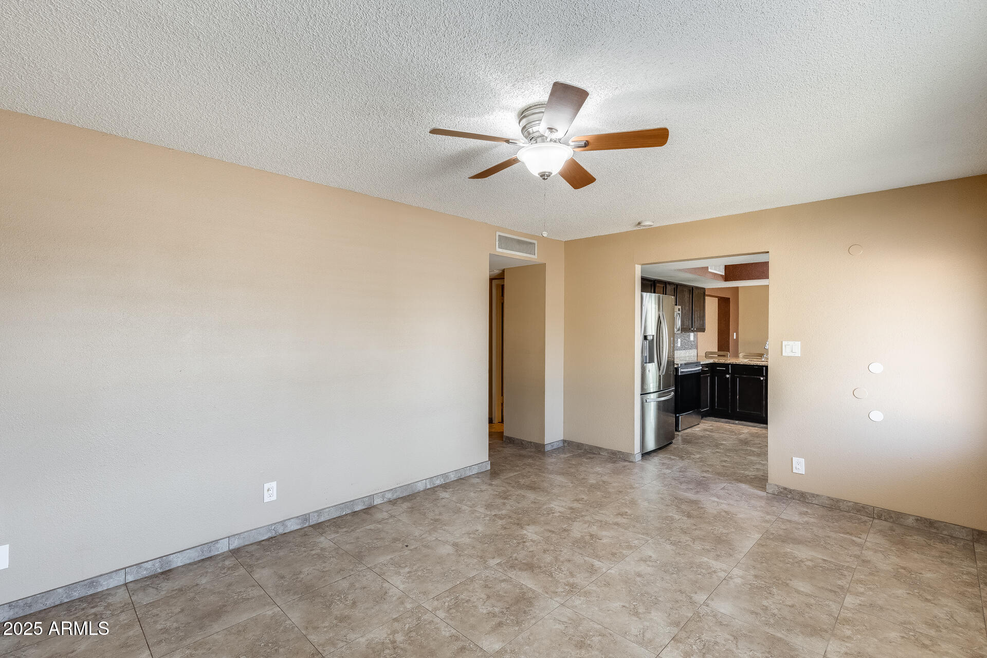 17633 North 15th Avenue Phoenix, AZ 85023 - Photo 7 of 32 an empty room with closet and windows