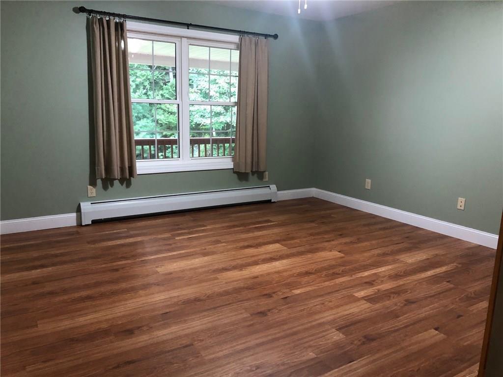 232 Pond Road Oakland, ME 04963 - Photo 17 of 23 The master bedroom faces the front...