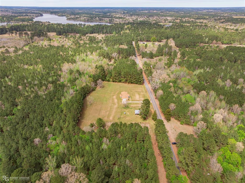 1303 Young Road Benton, LA 71006 - Photo 29 of 34 Bird's eye view of a large body of water and a forest