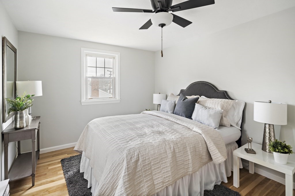 45 Brookbridge Road Stoneham, MA 02180 - Photo 11 of 34 a bedroom with a bed and a window