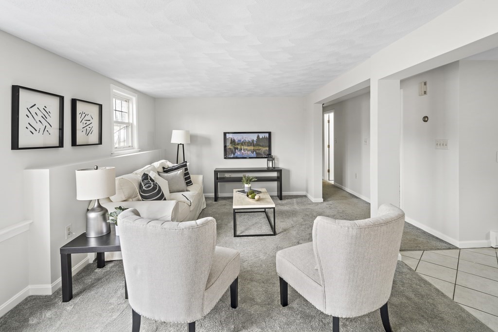 45 Brookbridge Road Stoneham, MA 02180 - Photo 18 of 34 a living room with furniture and window