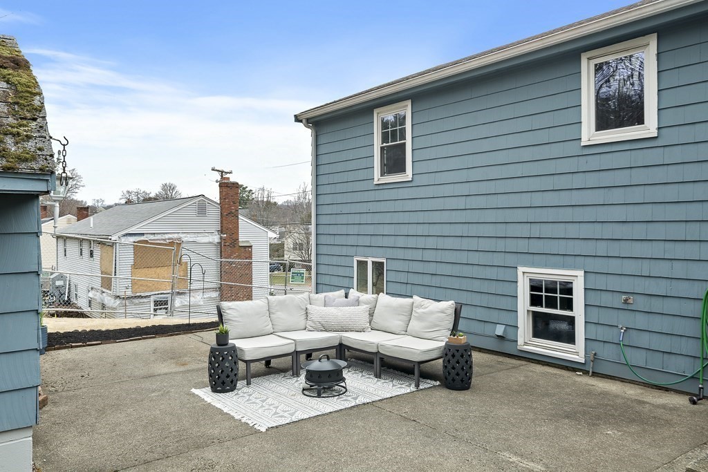 45 Brookbridge Road Stoneham, MA 02180 - Photo 27 of 34 a building outdoor space with patio furniture
