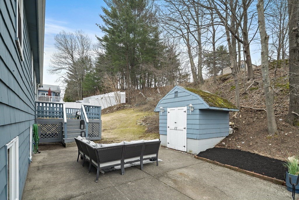 45 Brookbridge Road Stoneham, MA 02180 - Photo 30 of 34 a front view of a house with a garden
