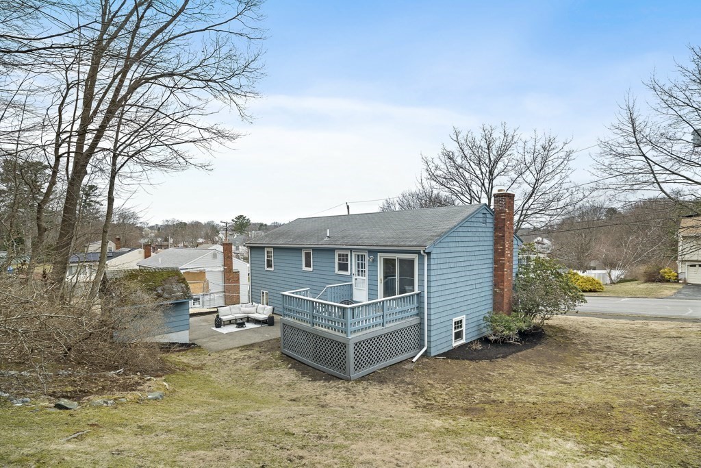45 Brookbridge Road Stoneham, MA 02180 - Photo 33 of 34 a view of a house with a yard