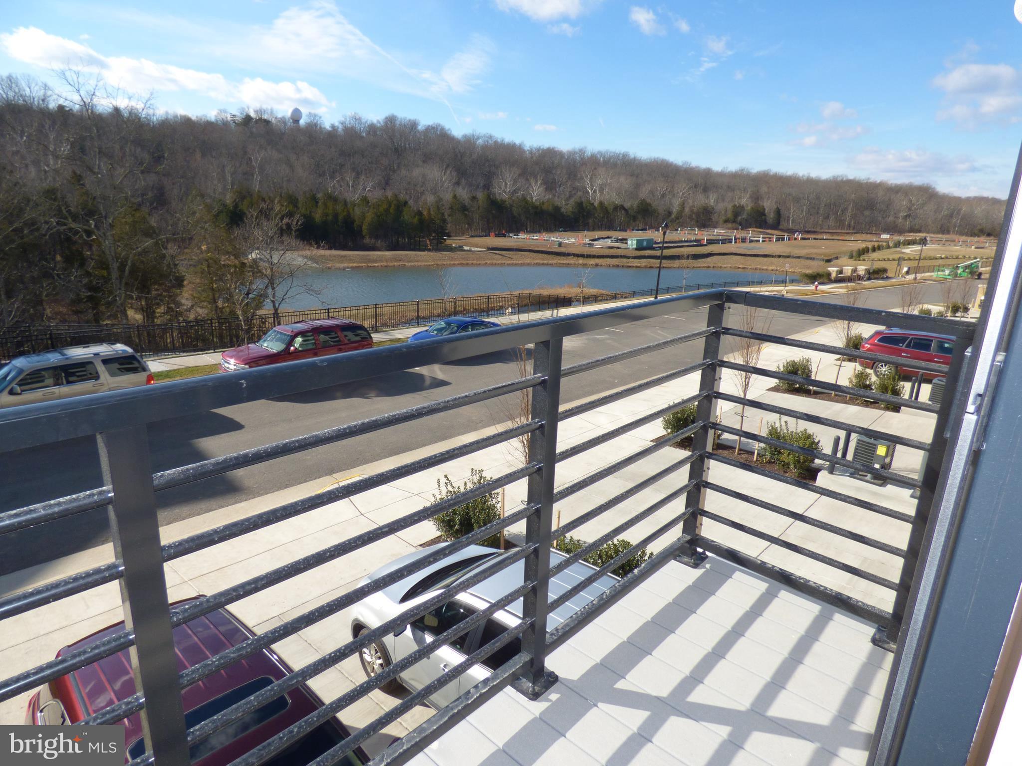 1428 Ribbon Limestone Terrace Southeast, Unit 108 Leesburg, VA 20175 - Photo 11 of 27 Balcony overlooking the pond