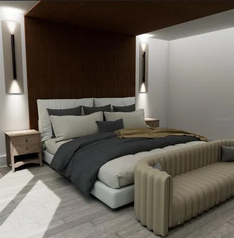 a living room with furniture and a mirror