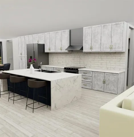a kitchen with a cabinets and appliances