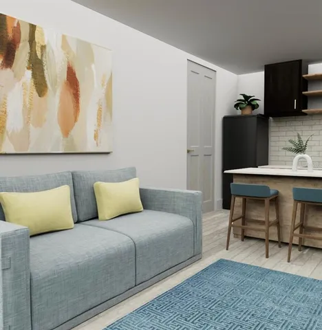 a bedroom with a bed and furniture