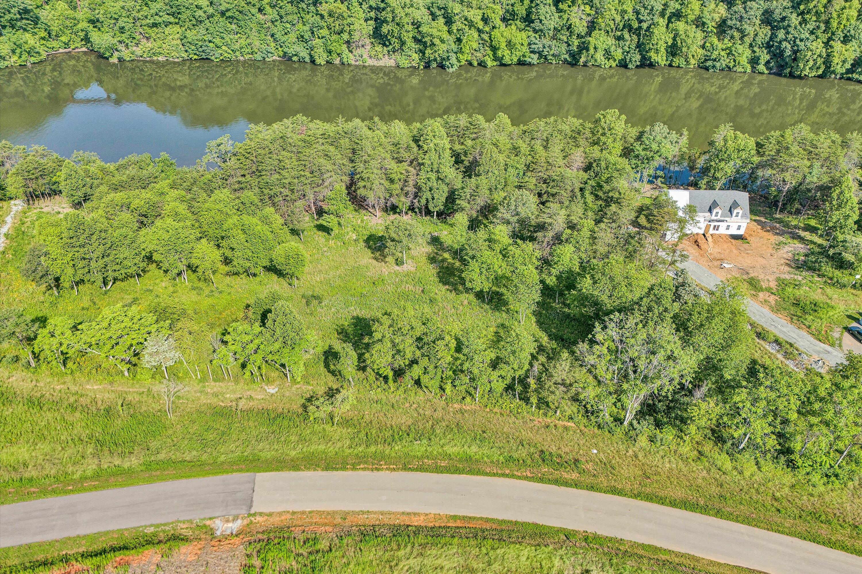 Lot 4 Springsteen Circle Hardy, VA 24101 - Photo 9 of 23 a view of a lake with a yard