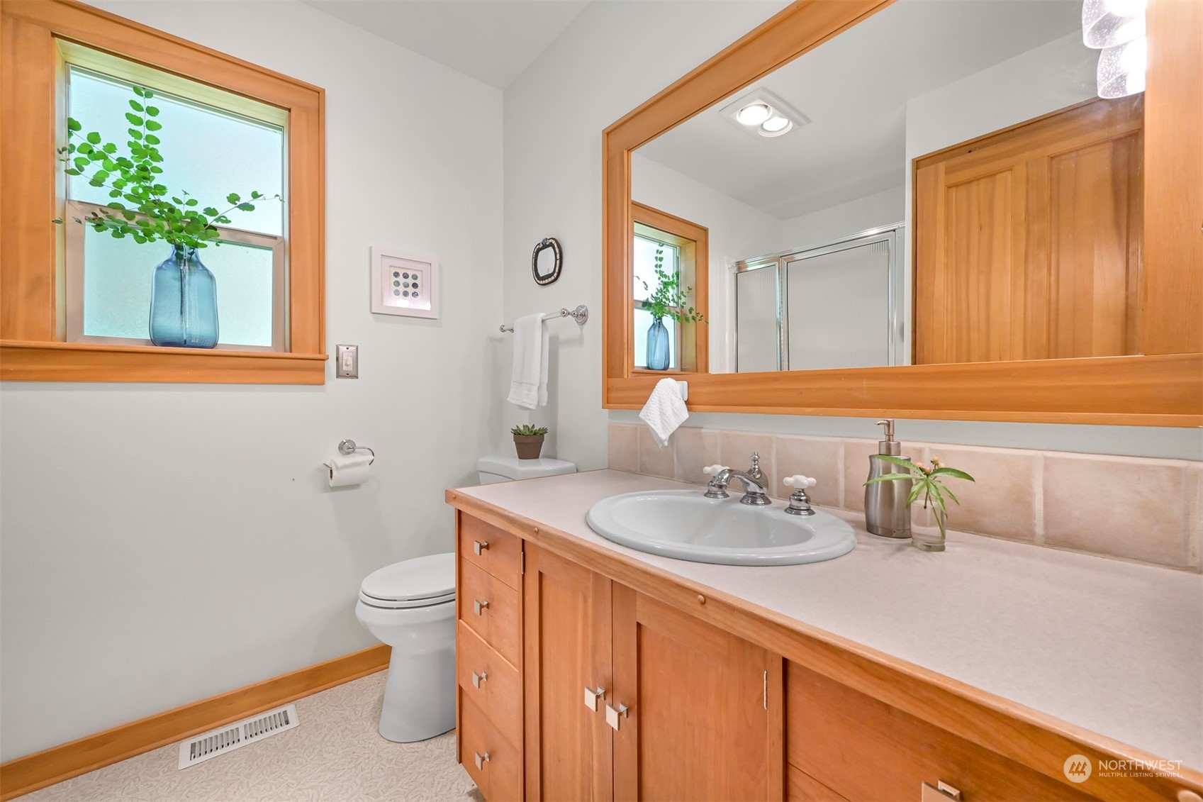 3030 Aldergrove Road Ferndale, WA 98248 - Photo 6 of 38 a bathroom with a granite countertop sink mirror vanity and toilet