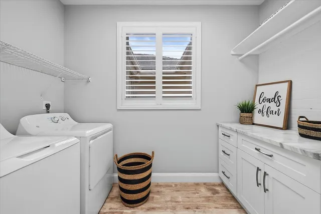 a view of a patio with a dining table and chairs