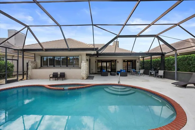 a view of a building with a backyard