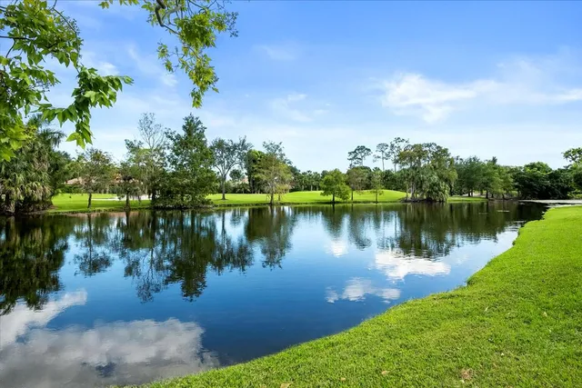 a view of a lake with a big yard