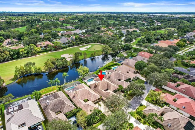 a view of a lake with a yard