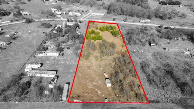 a view of swimming pool with a yard