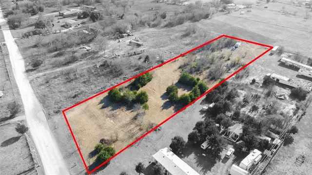 a wooden floor with a book and a table