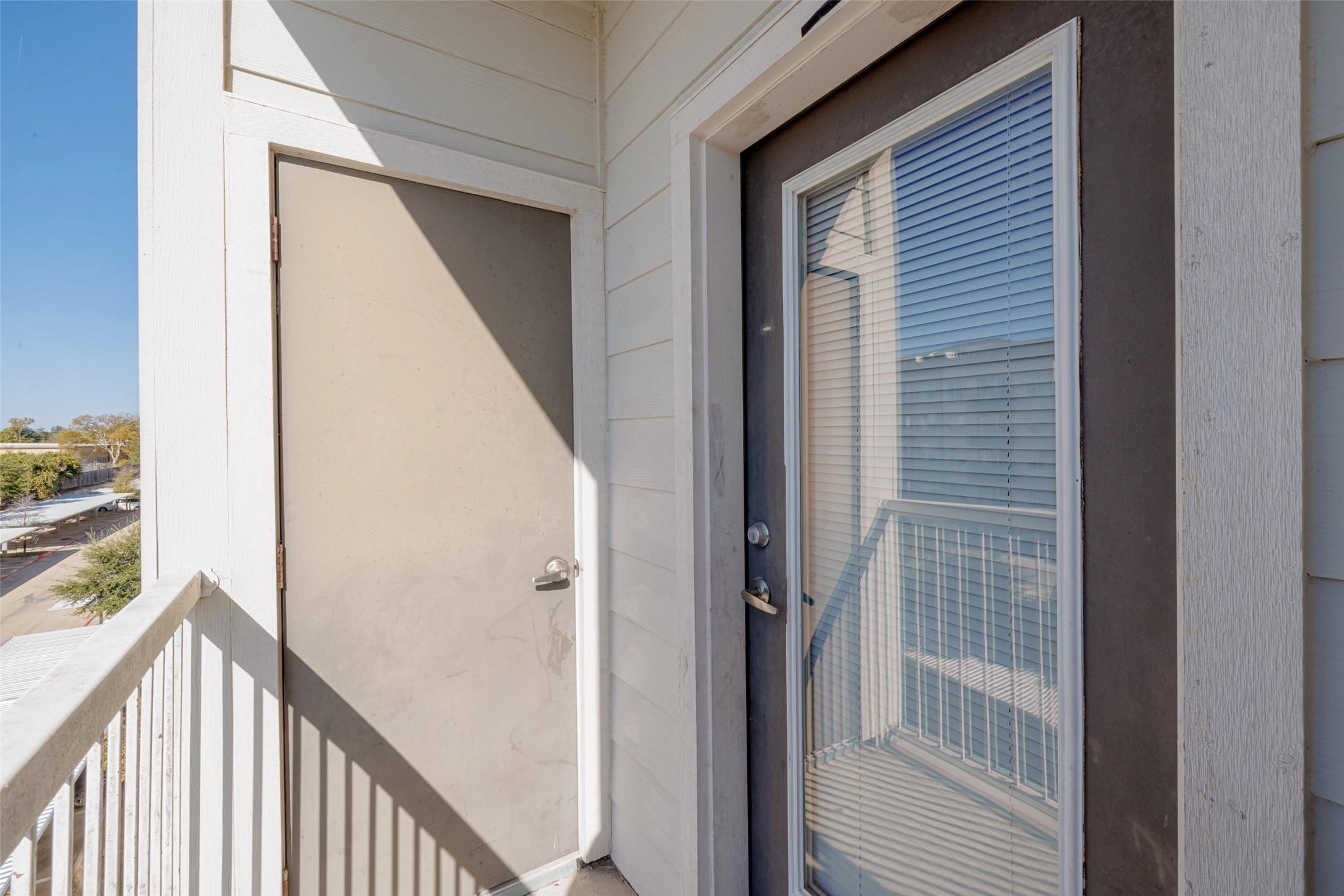5605 Springdale Road, Unit 444421 Austin, TX 78723 - Photo 2 of 21 a view of a balcony and a door