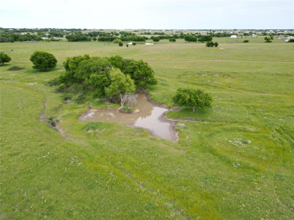 0 Pruett Road Krum, TX 76249 - Photo 18 of 40 a view of a lake with a city view