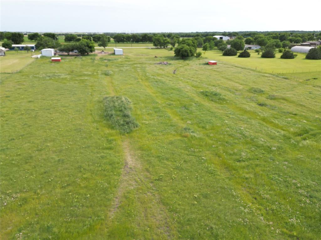 0 Pruett Road Krum, TX 76249 - Photo 23 of 40 a view of lawn chairs and an ocean view
