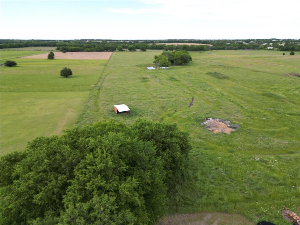 0 Pruett Road Krum, TX 76249 - Photo 26 of 40 a view of a lake with a houses
