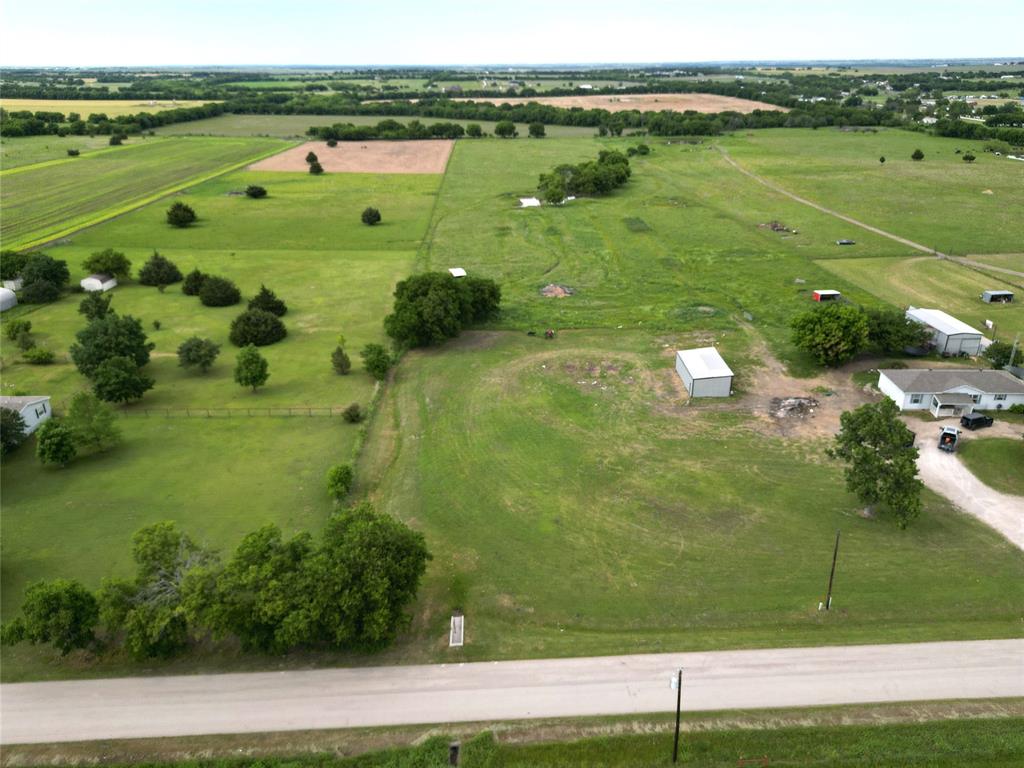 0 Pruett Road Krum, TX 76249 - Photo 5 of 40 a view of a lake with a yard