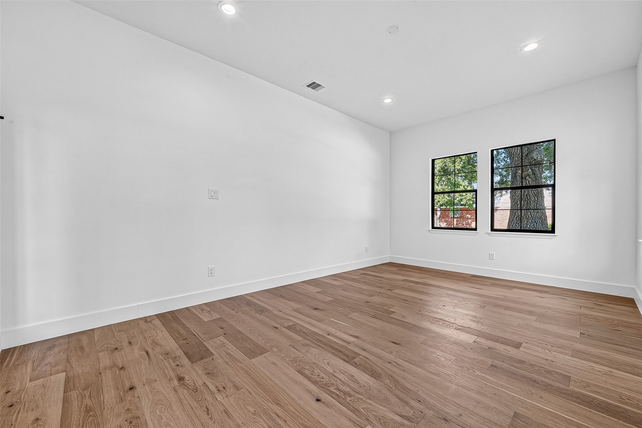 4802 Hummingbird Street Houston, TX 77035 - Photo 5 of 43 Large den/flex room with beautiful natural light with double French doors.