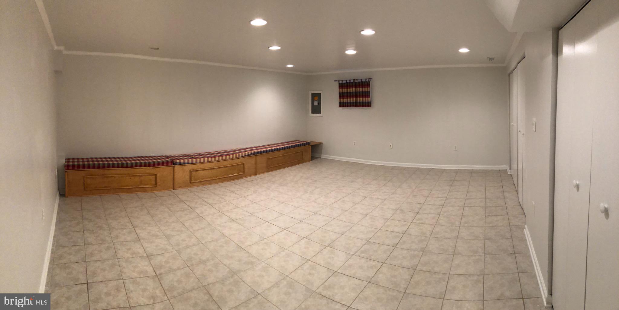 7913 Treeside Court Springfield, VA 22152 - Photo 10 of 14 Basement benches w/storage