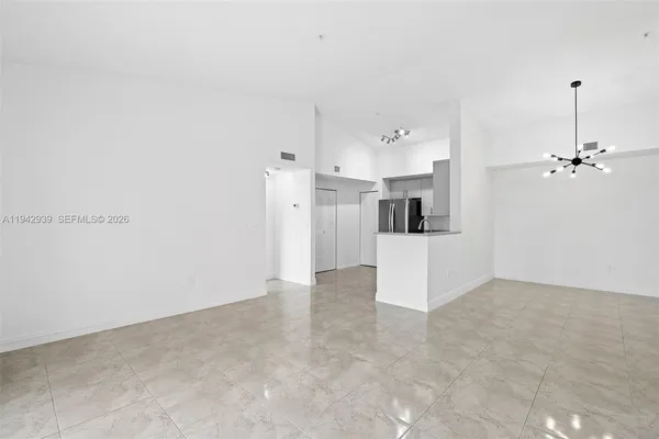 a view of a kitchen with a sink