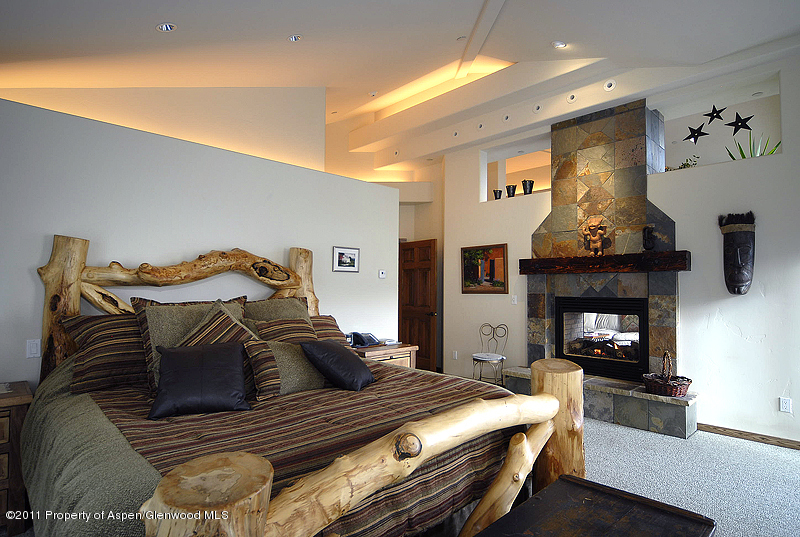 128 Ridge Road Basalt, CO 81621 - Photo 5 of 10 Master suite with fireplace