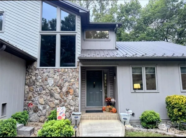 a view of a entryway door front of house