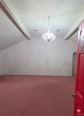 a view of a livingroom with a chandelier