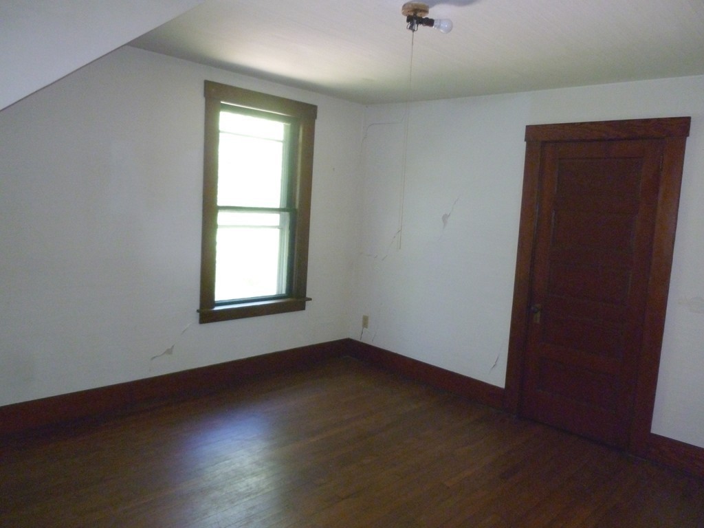16 Jones Road Pelham, MA 01002 - Photo 11 of 15 an empty room with a window